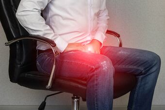 A man with a sign of prostatitis